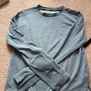 Nike woman’s Blue Long Sleeve Shirt